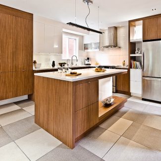Elegant Kitchen with central island and white cabinets.